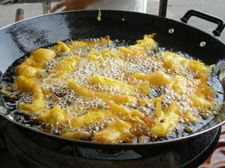 Banana fritters in hot wok