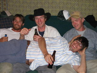 Eric, Jeremy, and Blake, cradling dear Aaron