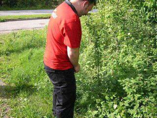 ivan.. havin' a wizz in the bushes