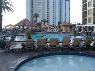 Starting a stroll out by the pool