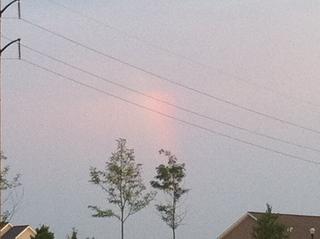 Little piece of rainbow stuck in the sky